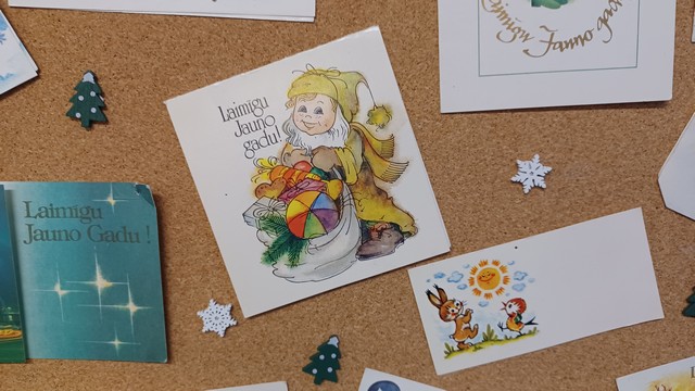 Četras kartītes ar apsveikumu jaunajā gadā.